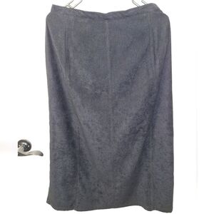 A Harve Benard black maxi skirt in a size 8p. It's pre-loved in great condition